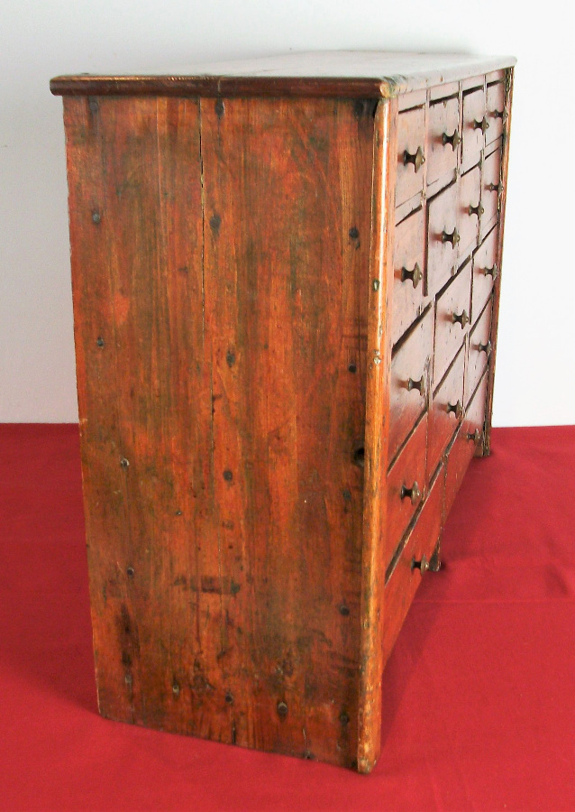  	A Collectors cabinet of 16 Drawers dated 1910